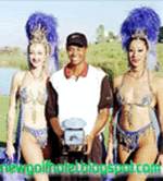 Tiger Woods holding a big golf cup