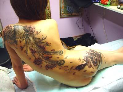 girl with dragon tattoo back. Dragon Lower Back Tattoo